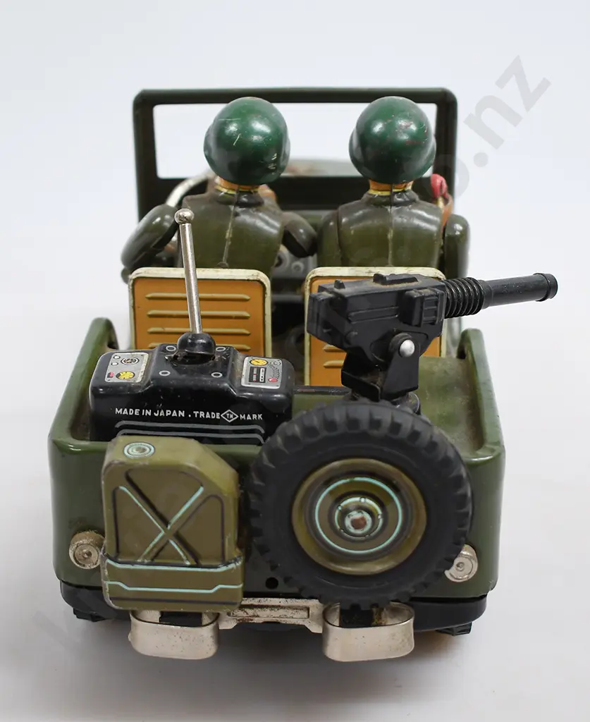 TIN PLATED BATTERY OPERATED ARMY JEEP Image 1++