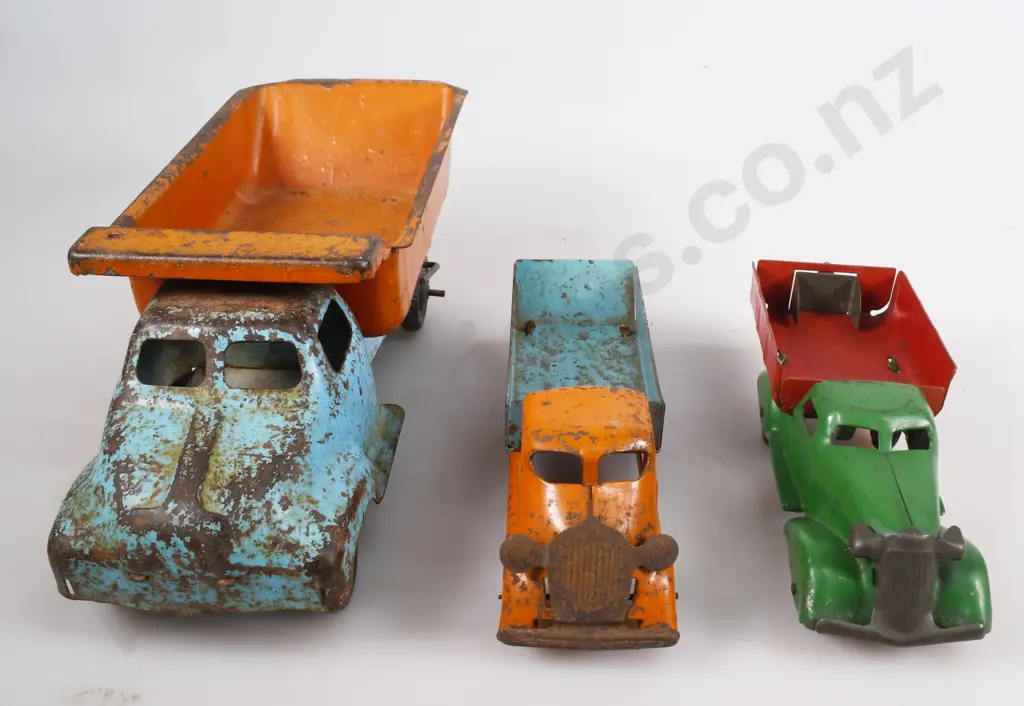 PRESSED STEEL TIP TRUCKS Image 1++