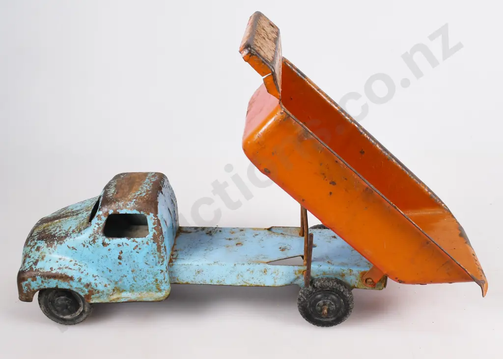 PRESSED STEEL TIP TRUCKS Image 1++