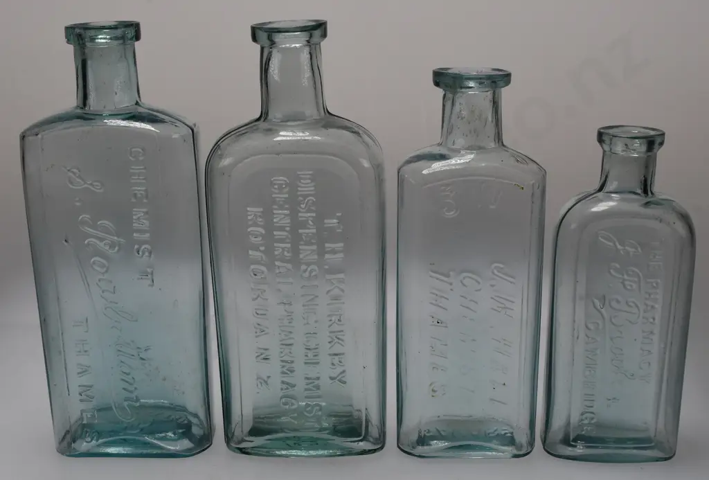NORTH ISLAND CHEMIST BOTTLES  X 4 Image 1++
