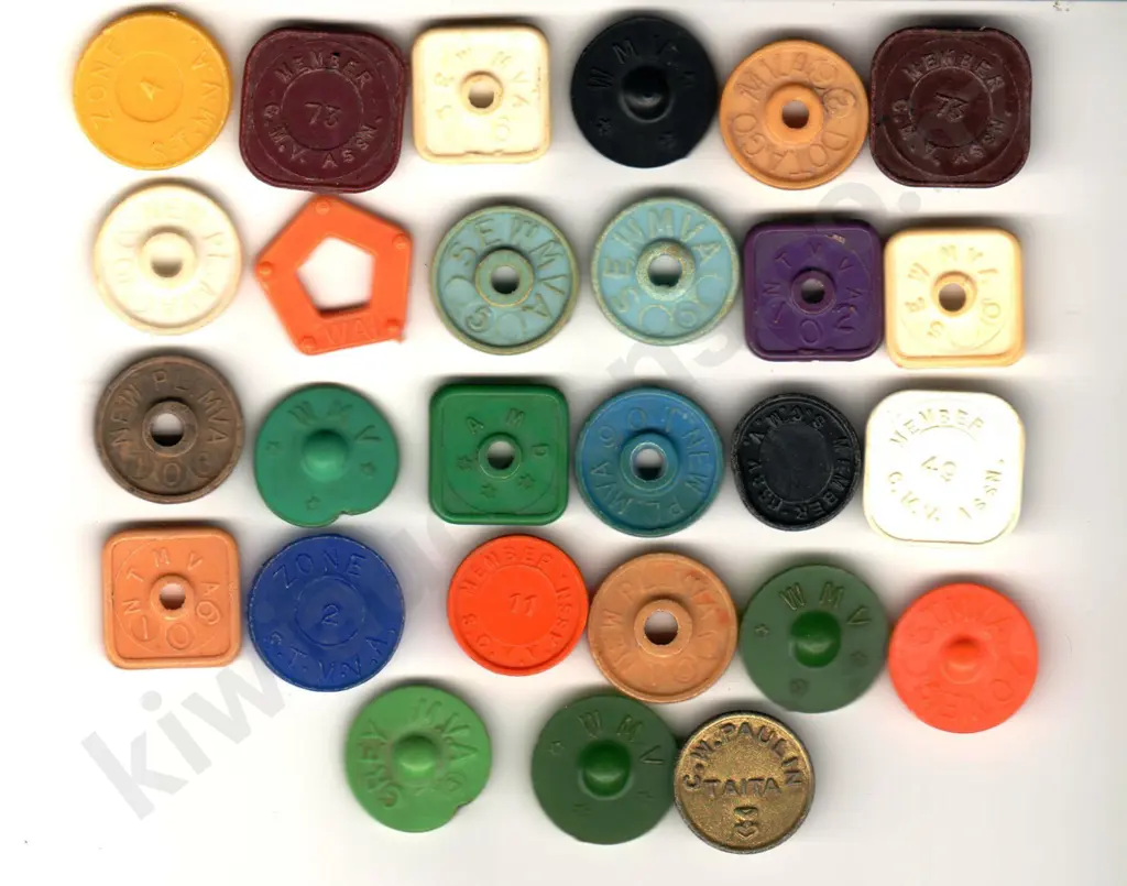 ASSORTED PLASTIC MILK TOKENS X 27 Image 1++