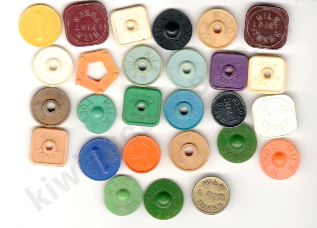 ASSORTED PLASTIC MILK TOKENS X 27 Image 1++