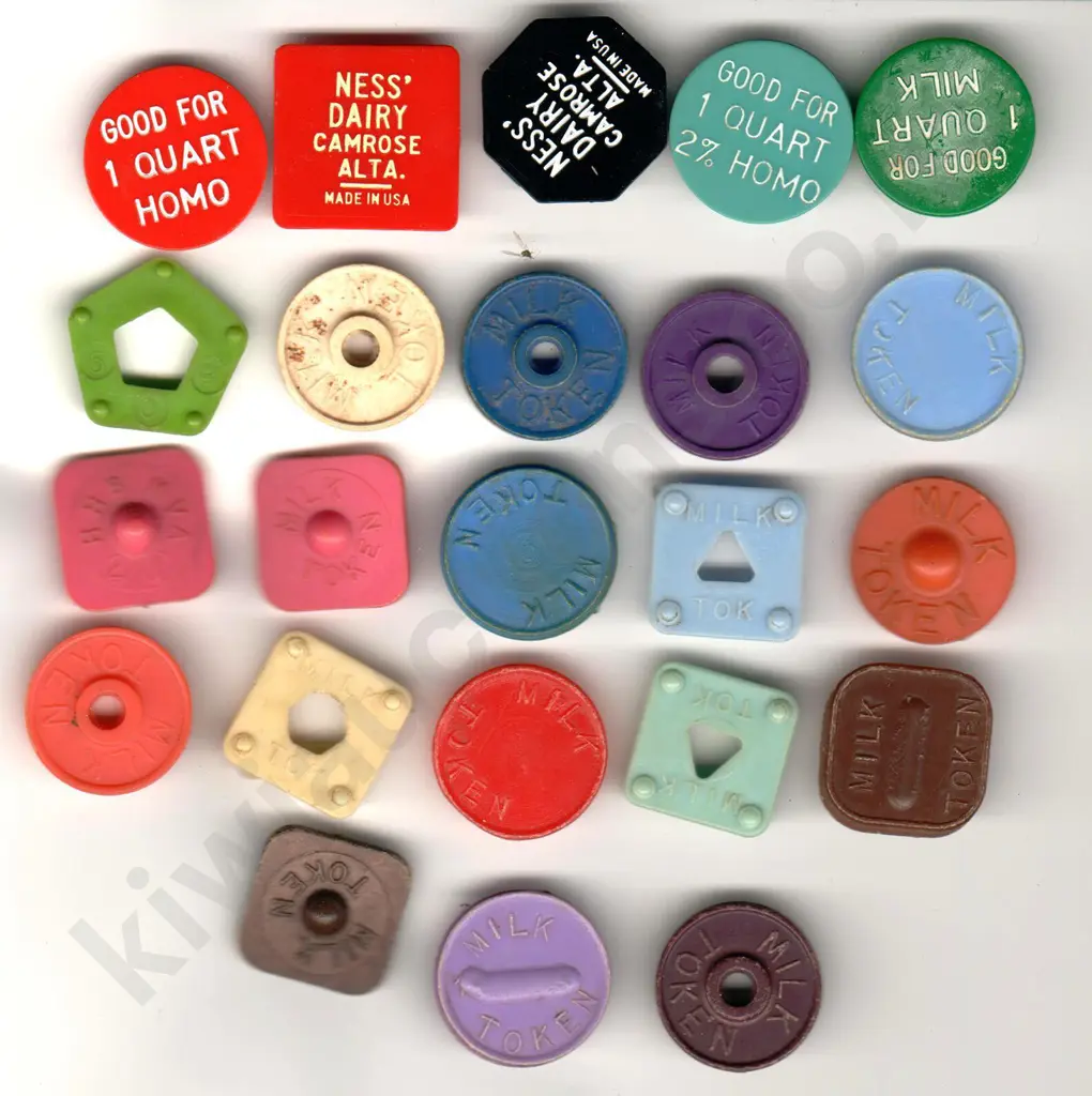 ASSORTED PLASTIC MILK TOKENS X 23 Image 1++