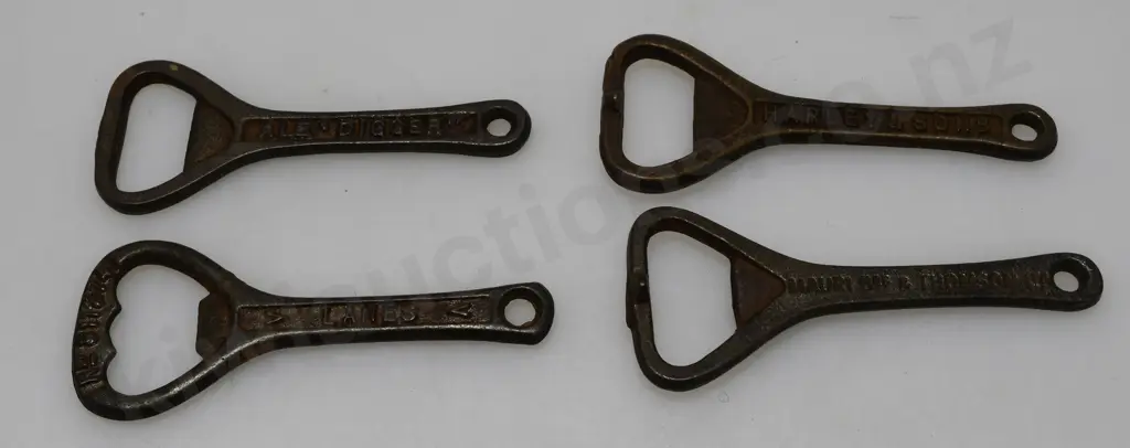 ASSORTED BREWERY BOTTLE OPENERS X 12 Image 1++