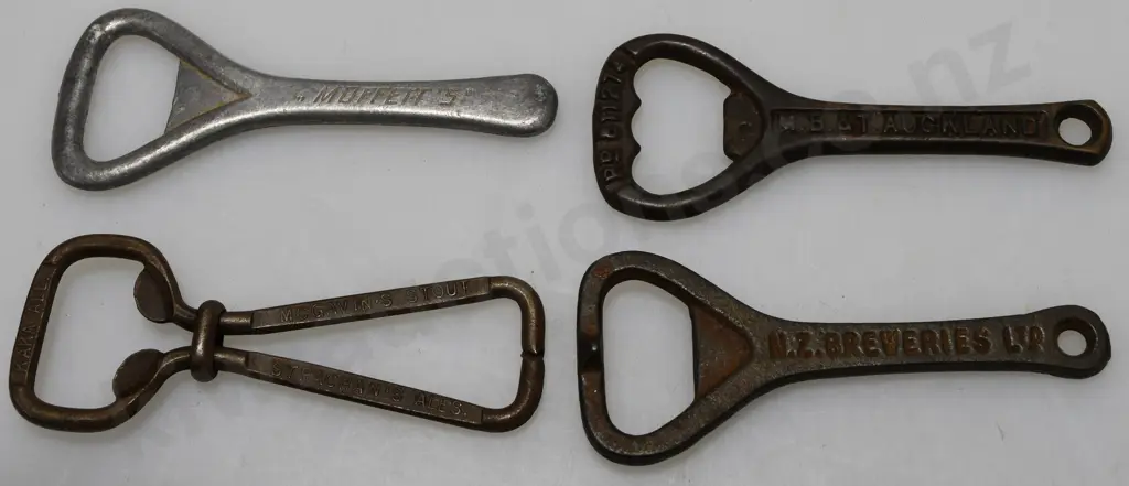 ASSORTED BREWERY BOTTLE OPENERS X 12 Image 1++