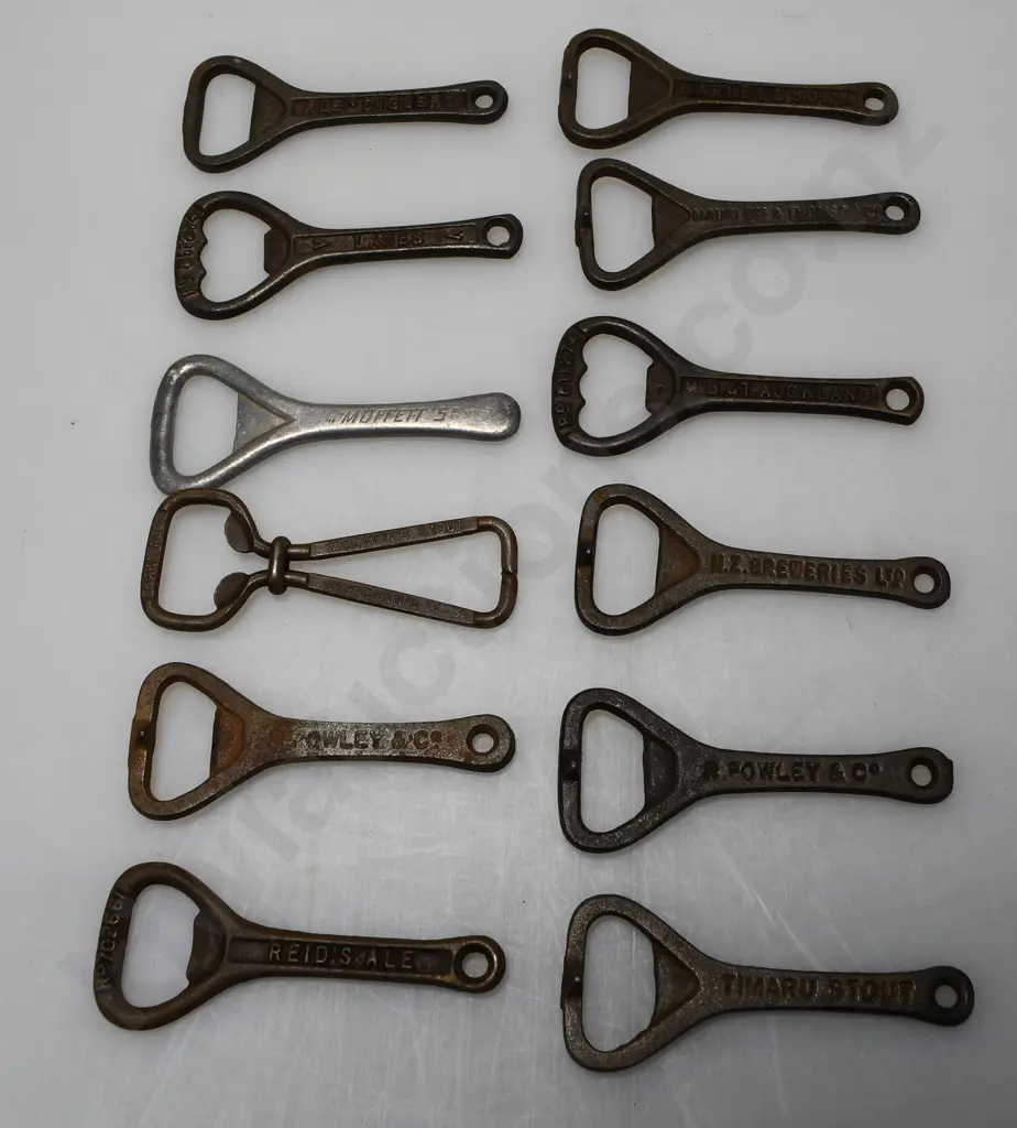 ASSORTED BREWERY BOTTLE OPENERS X 12 Image 1++